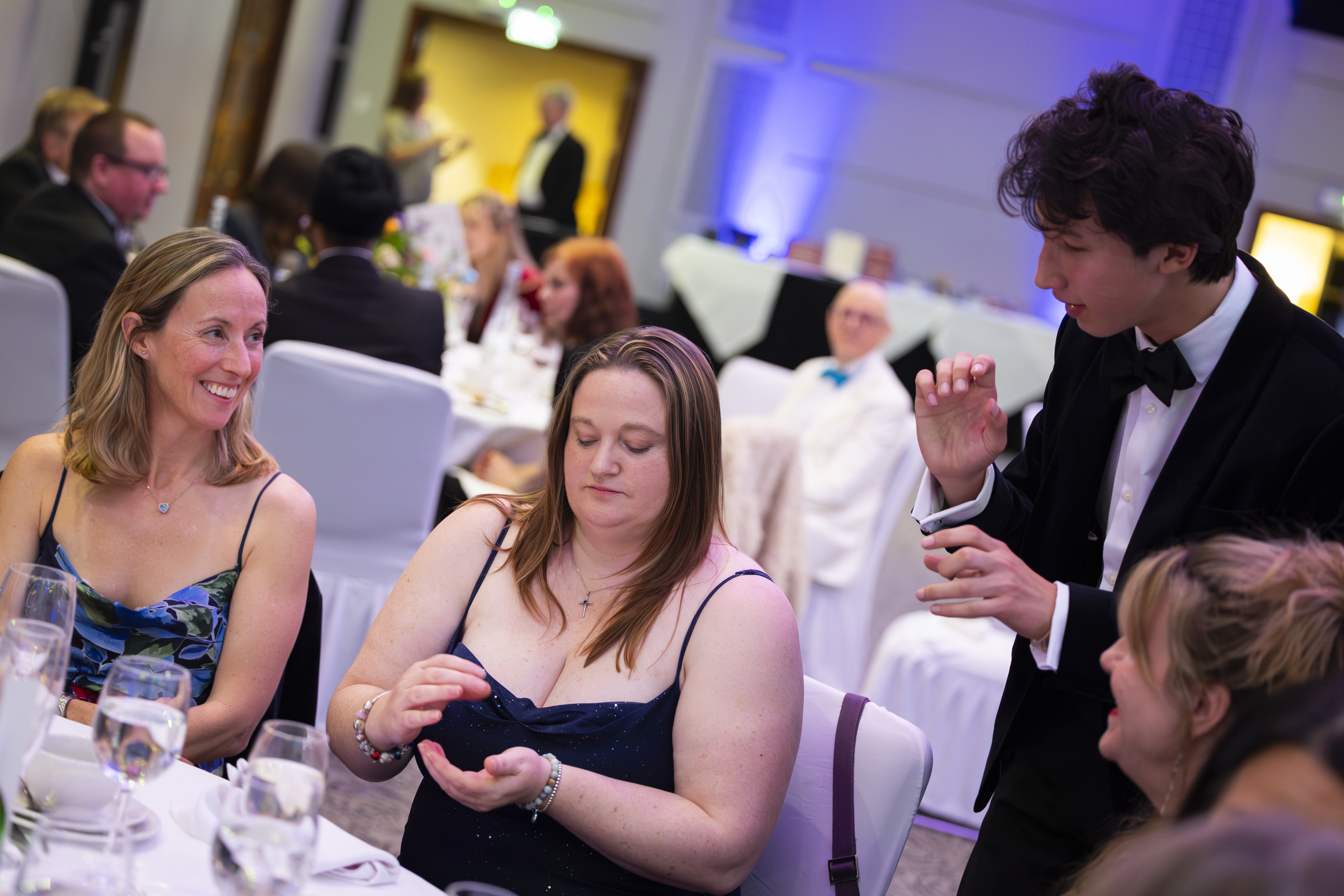 Noah entertaining guests at a private event